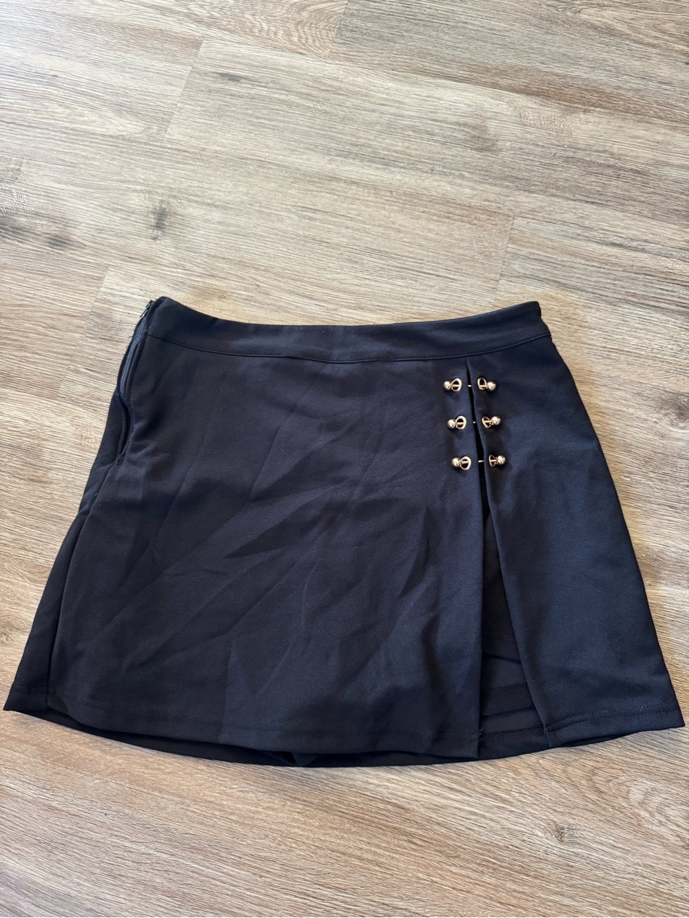Black Mini Skirt with Gold-Tone Button Accents